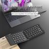 Tragbare Bluetooth-Tastatur mit Doppelfaltung für mobile Geräte und Laptops
