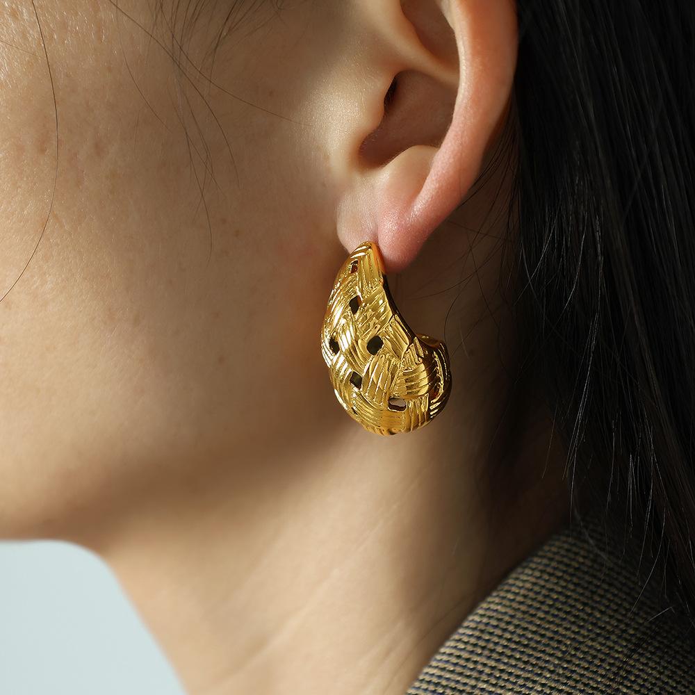 European and American personality woven hollow earrings simple water drop semi-round earrings retro cold wind Internet celebrity earrings