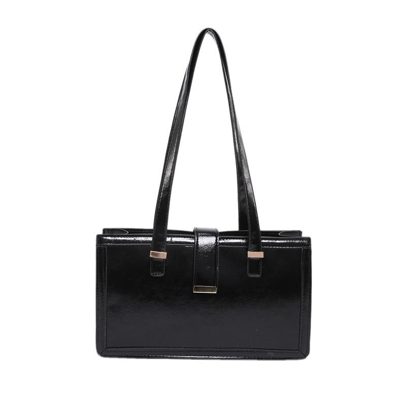 Large capacity bag women's autumn and winter retro 2025 new niche design shoulder handbag oilskin bag