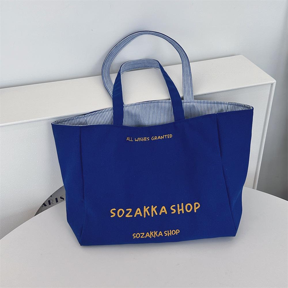 

Letter embroidered canvas bag literary and leisure large-capacity shoulder bag women s front and back tote bag синій
