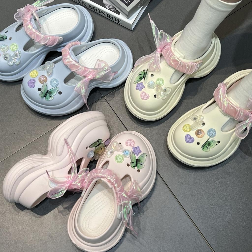 Fashion high-end hole shoes women's summer new outer wear runaway tired feet non-slip bag head slippers