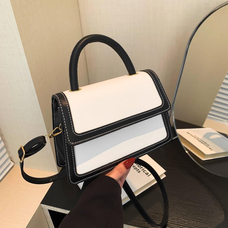 Splicing color clamshell type casual summer new simple Korean version fashionable foreign style women's hand carry shoulder small square bag soft