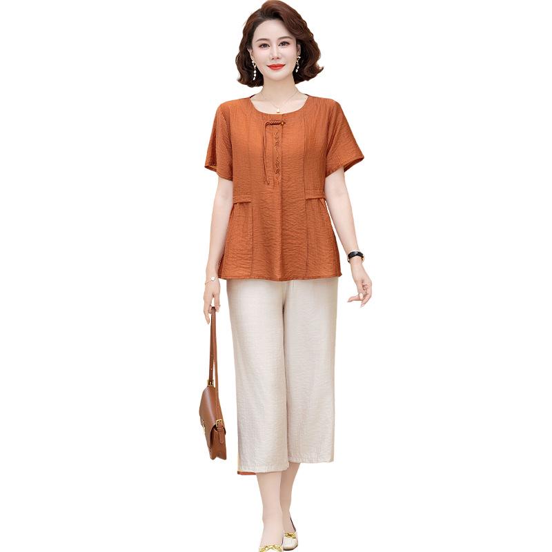 

2026 Women s Summer Elegant Suit: Short-Sleeved Top & Wide-Leg Pants Set 5XL [recommended 150-165 jin]