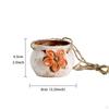 Elegant Hanging Ceramic Planter for Outdoor Spaces