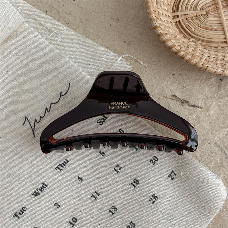 Gold-Labeled Acetate Dumpling Claw Clip Hair Accessory