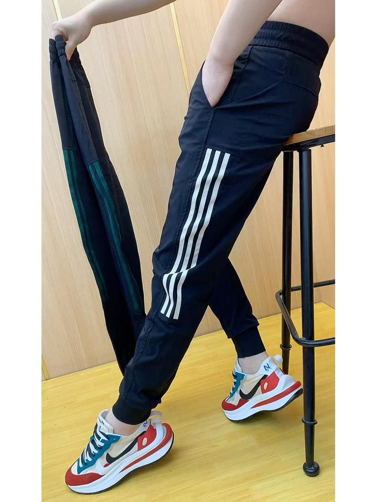 Men's Stylish Ice Silk Quick-Dry Harem Pants - Spliced, Fashionable, Versatile, and Trendy for Spring and Summer.