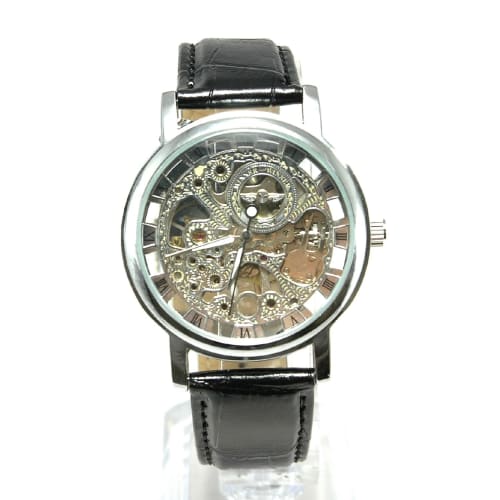 

Ностальгические скелетонизированные наручные часы с ручным заводом и видимым движением балансового колеса (серебристая кожа с черными акцентами)