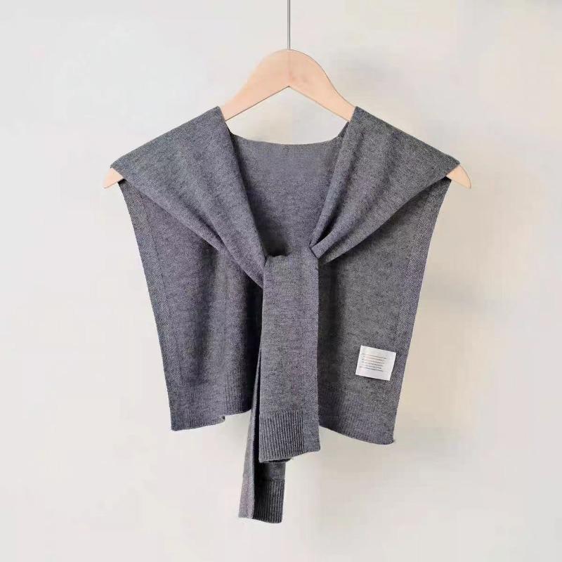 Solid color knitted small shawl fashionable versatile hollow high-end atmosphere white temperament outer small shawl