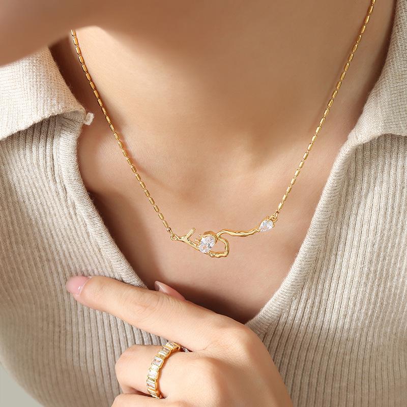 Celebrity-Inspired Gold-Plated Titanium Steel Necklace with Zircon Root-Shaped Pendant