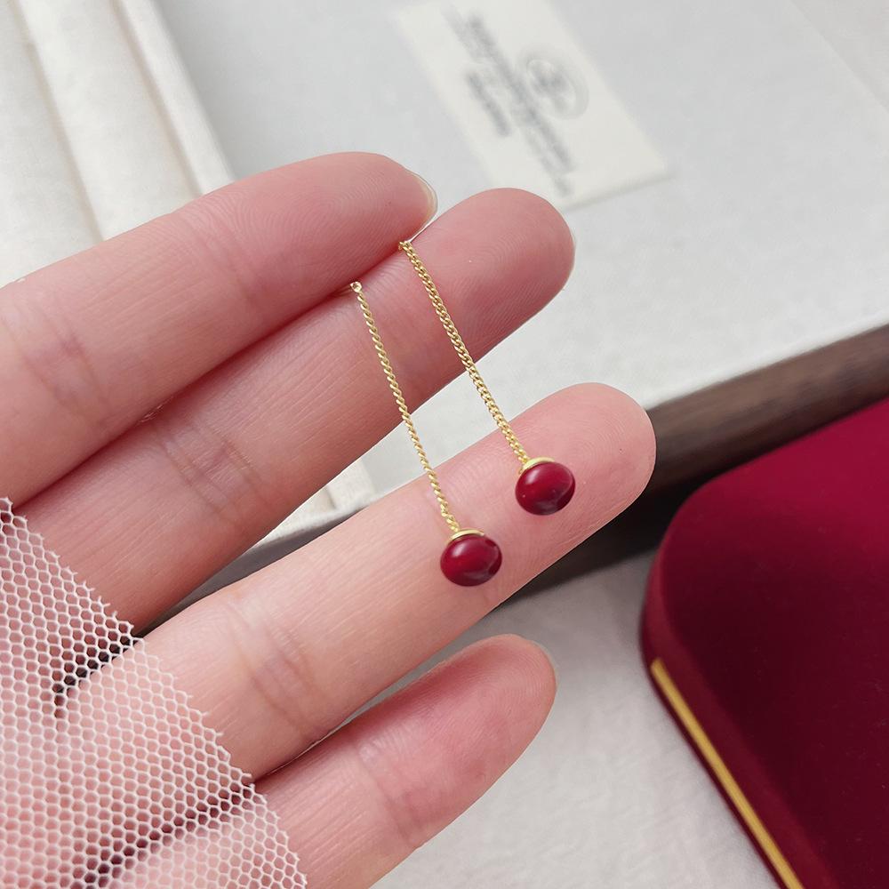 Cat's Eye Tassel Ear Chain 2024 Trend: Elegant Long Earrings with Light Luxury Design