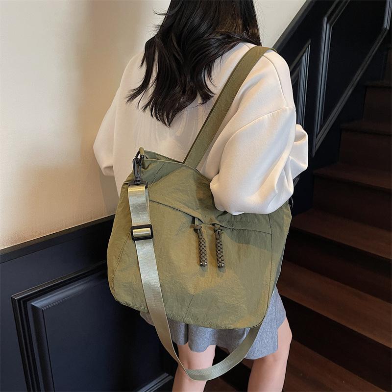 Simple large capacity canvas bag women's casual solid color commuting shoulder tote bag college students class sleigh bag schoolbag