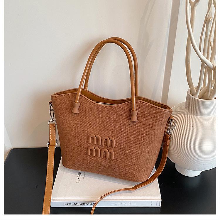 

Премиальная сумка через плечо женская сумка 2025 новая ретро нишевый дизайн сумка-мессенджер женская портативная сумка-ведро тренд коричневый