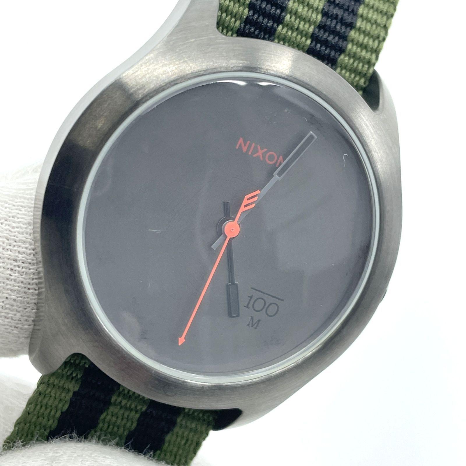 Used Operational NIXON The Quad Quartz watch Nylon belt Gray dial