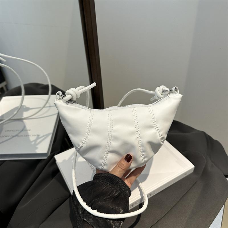 2025 autumn new solid color splicing dumpling bag retro fashion foreign style casual shoulder crossbody armpit bag