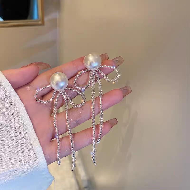 New temperament fringed bow earrings female, niche design handmade pearl Internet celebrity earrings earrings