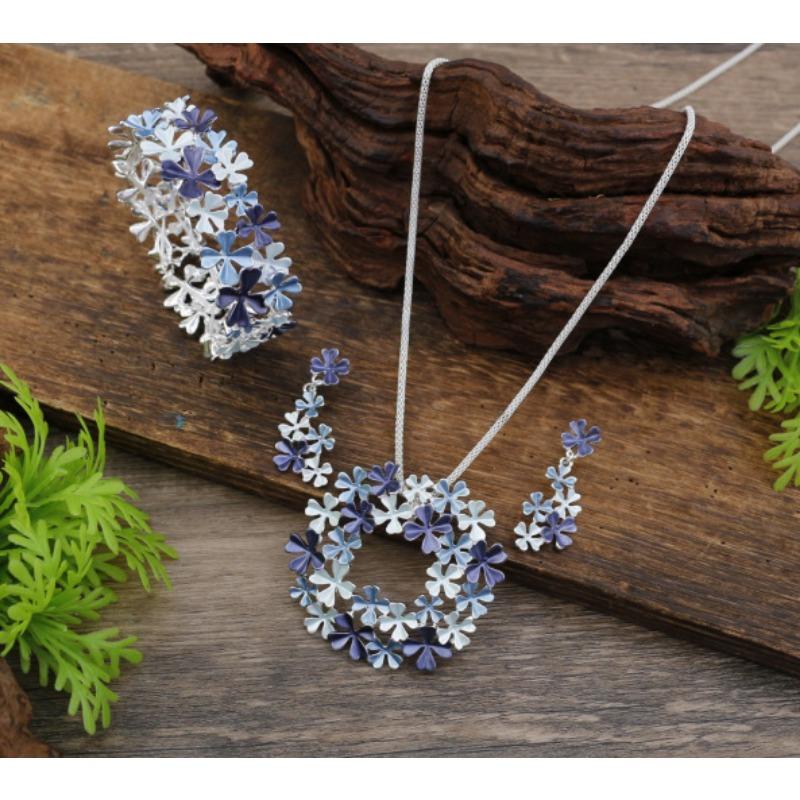 New enamel color hollow flower stud earrings pendant bracelet set women's autumn and winter high-end flower necklace