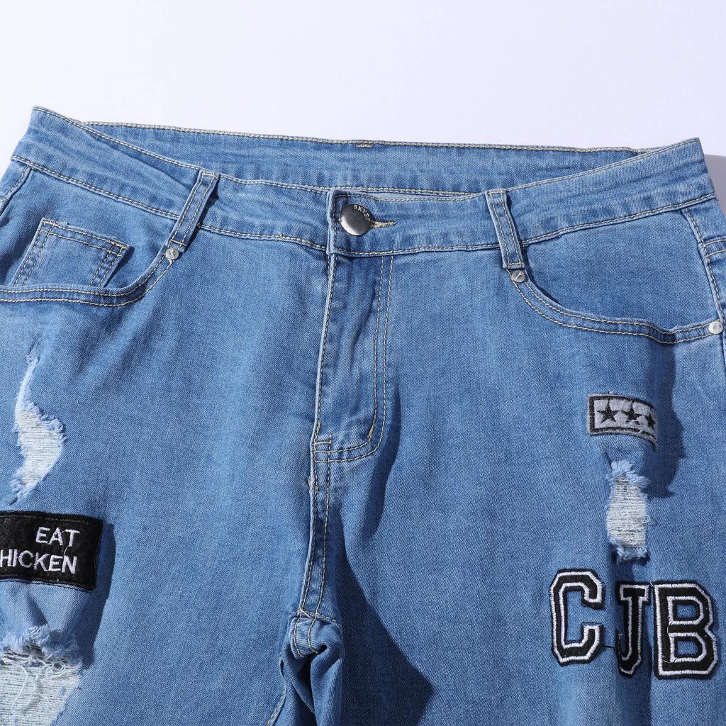 Blugi de modă pentru bărbați de primăvară cu găuri și blugi subțiri la modă