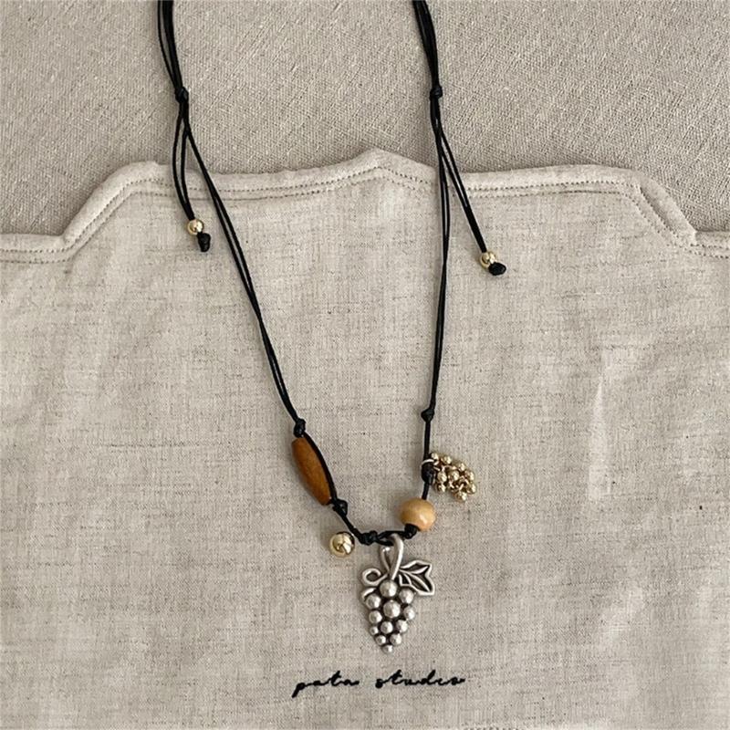 Stylish Alloy Accent Necklace With Sliding Closure Braided Cord and Natural Wood Materials