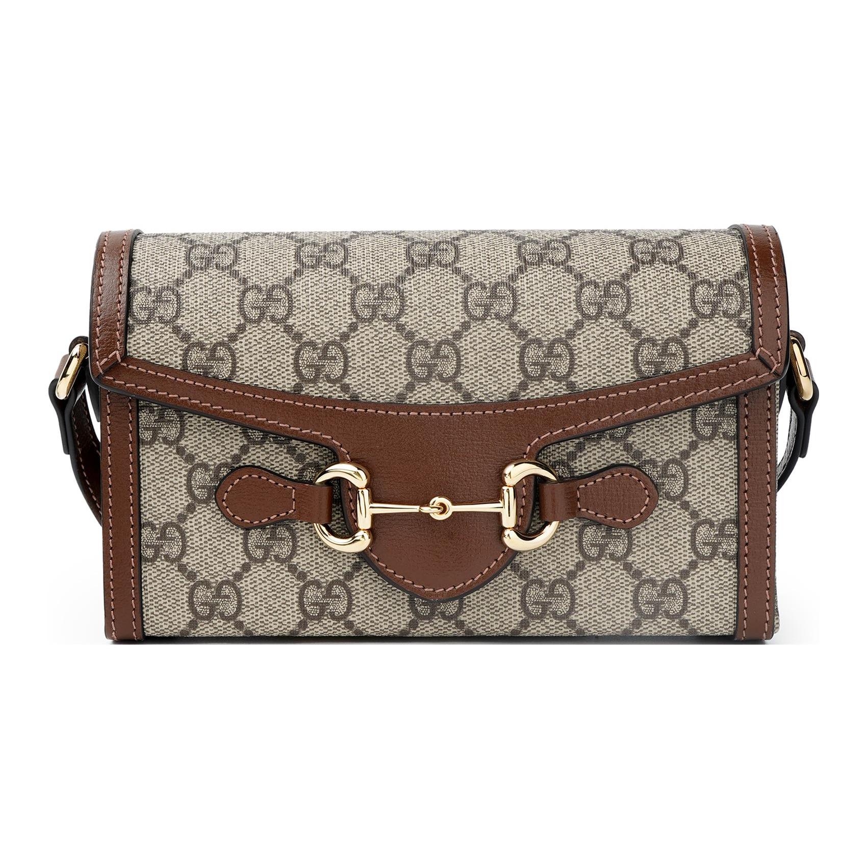 

Сумка-месенджер Gucci Horsebit 1955 з пряжкою Horsebit та зістареним квітковим логотипом, виготовлена з канви Box(Basic Set+Box) ебеновий/коричневий
