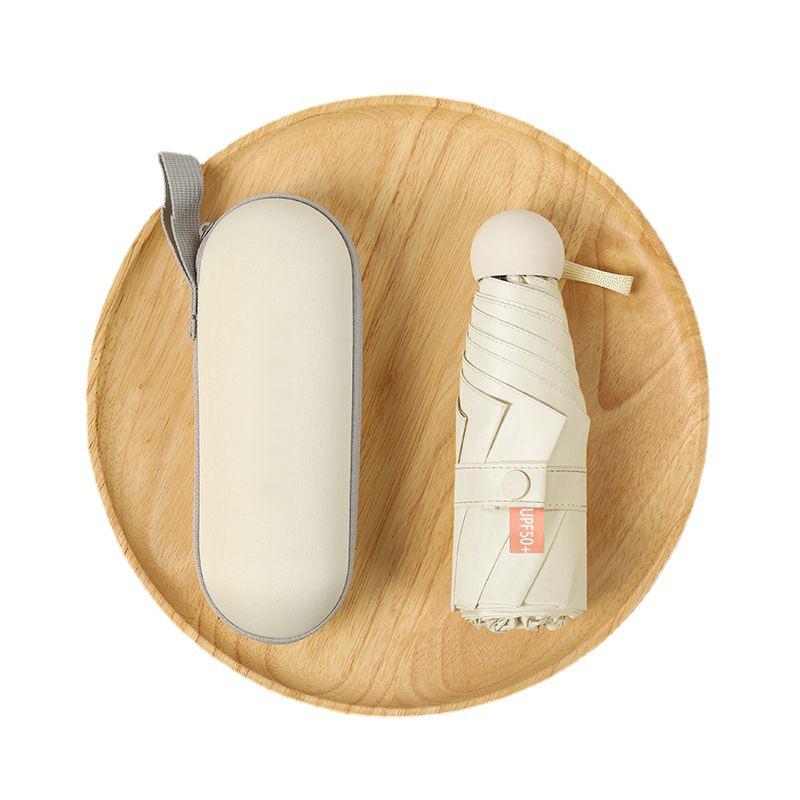 Parasol Capsule Sun Umbrella: 50% Off Mini UV Protection for Women, Dual-Purpose for Sun and Rain.