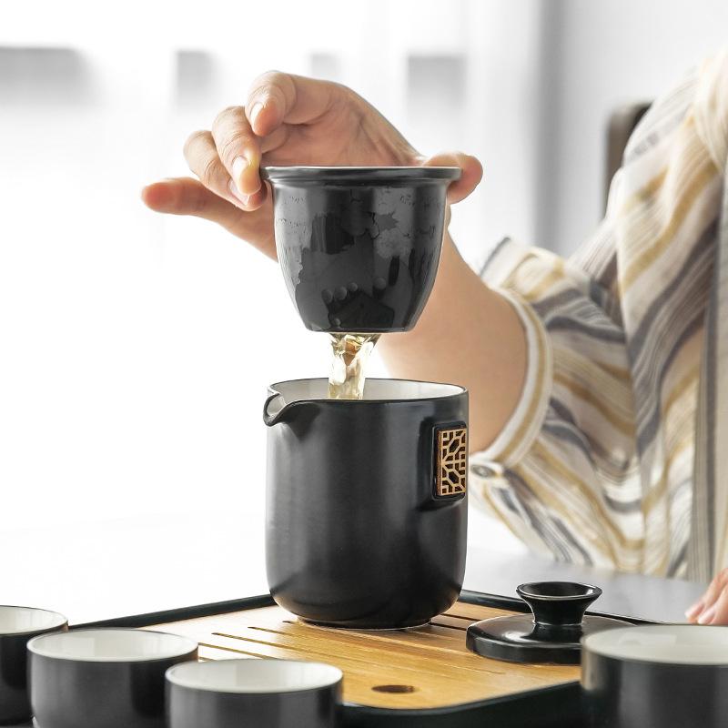 Portable four-load ceramic travel kung fu tea set, one pot and four cups of ceramic simple gift box, gift set