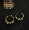 2026 Elegant Twisted Hollow Earrings: High-End Feel Hoop and Stud Earrings for Women, Luxury Niche Design & Timeless Temperament Jewelry.