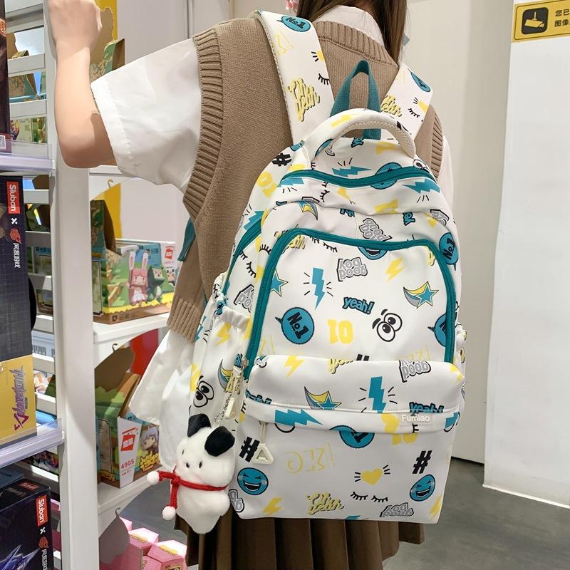 

College style small fresh soft sister large capacity student schoolbag spring new printed backpack with pendant