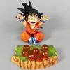 12CM Anime Son Goku Figure Dragon Ball Sitting Model Toy Doll Action Figure Wishing Dragon Ball Scene Desktop Ornament Gift