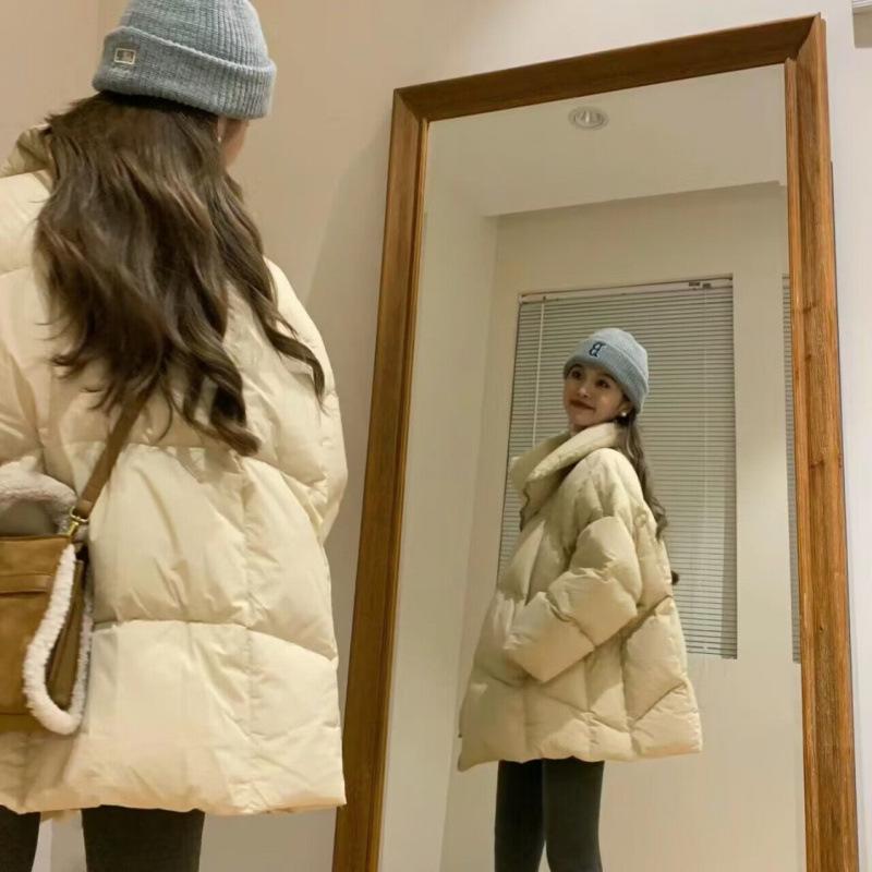 Design Sense Women's Winter 2024 Thickened Warm Loose Style Cotton Jacket with Diagonal Zipper