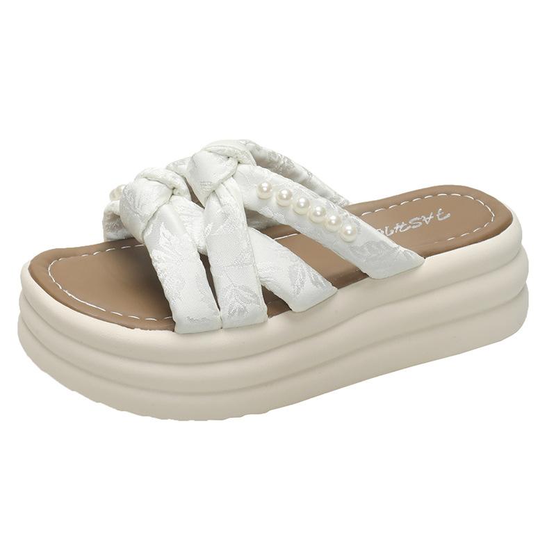 

Height-increasing thick-bottomed muffin fairy wind-cool slippers women s 2025 new summer wear fashion beach one-word slippers 35