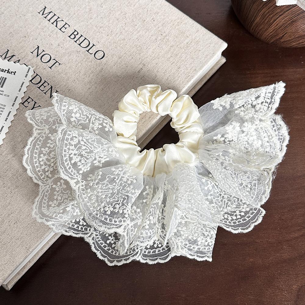 

Double-layer Skirt Hem Braided Hair Band for Women with A Sophisticated Look. Bun Hairstyle with Hair Rope. Low Ponytail with Hair Tie.