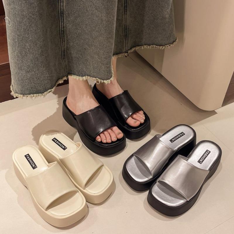 Summer new thick-soled one-word slippers for women's summer outer wear design sense niche muffin shoes open-toed cool slippers for women