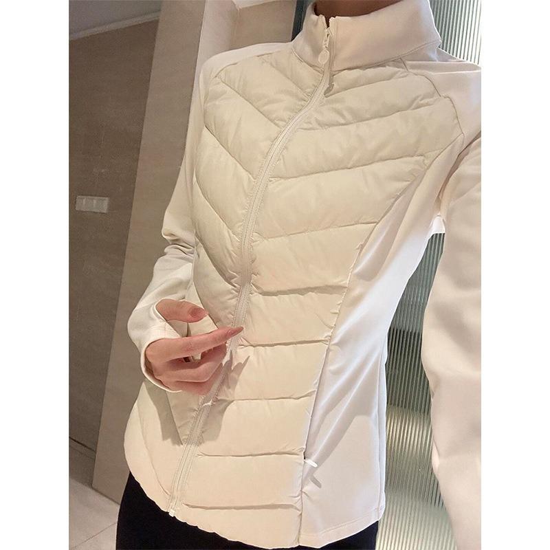 Piumino nero da donna autunno e inverno, vestibilità aderente e fodera calda, top corto