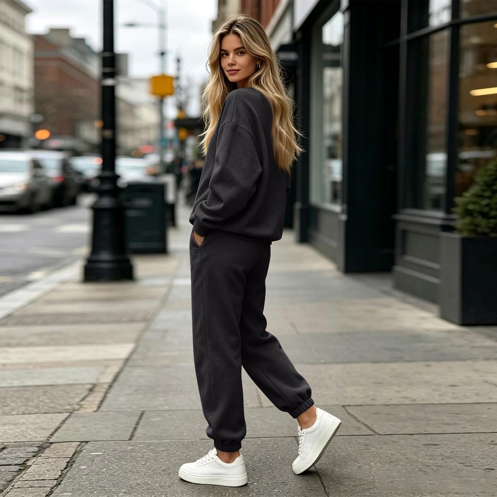 Completo da ginnastica da donna a 2 pezzi con pantaloni a gamba larga per un uso casual quotidiano