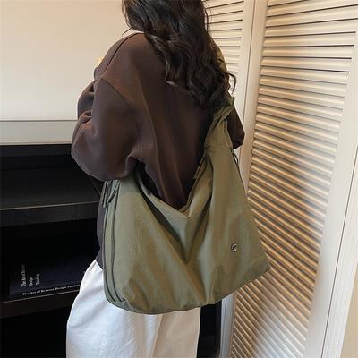 Minimalist Nylon Shoulder Bag for Women – Soft Drawstring Tote with Adjustable Strap and Compact Design, Perfect for Daily Use