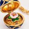 Enamel Egg Pendant Necklace with Hinged Opening, Collarbone Chain, Gold-Tone Chain, and Easter Outfit Styling for Women
