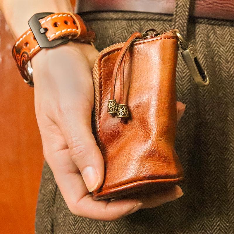 Men's Retro Genuine Leather Waist Key Holder: Large Capacity Cowhide Bucket Bag with Multifunctional Zipper Pouch.