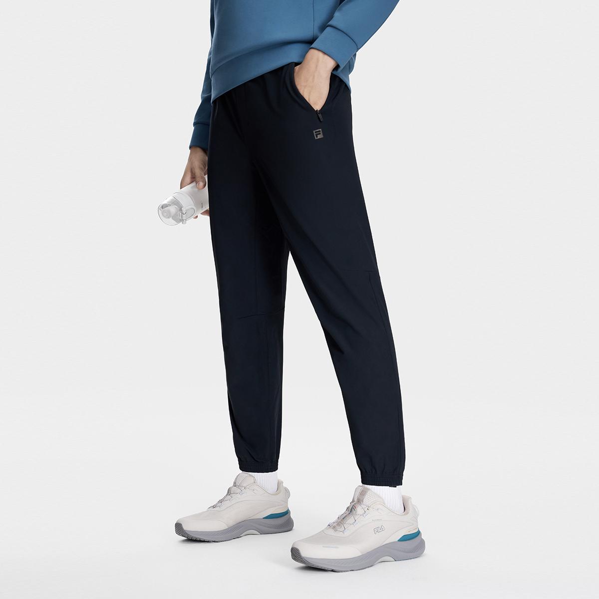 

Новые вязаные спортивные штаны FILA унисекс угольно-черные A11M341805F-BK L