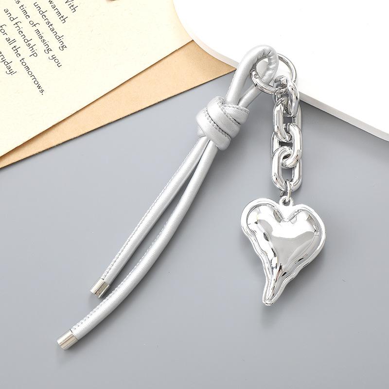 

Брелок-подвеска в форме сердца из искусственной кожи и плетеного шнура, шнурок для телефона из плетеного шнура, кольцо для ключей, винтажный декор для сумки серебряный