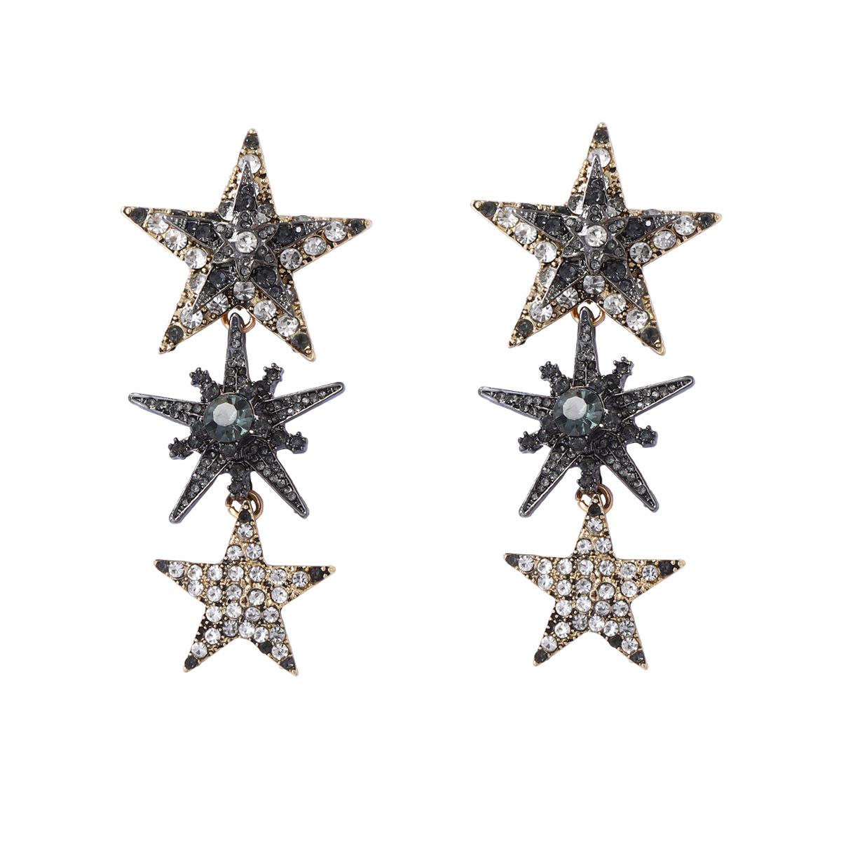

European and American exquisite light luxury exaggerated fringed long temperament alloy full diamond super flash five-pointed star splicing earrings золотий