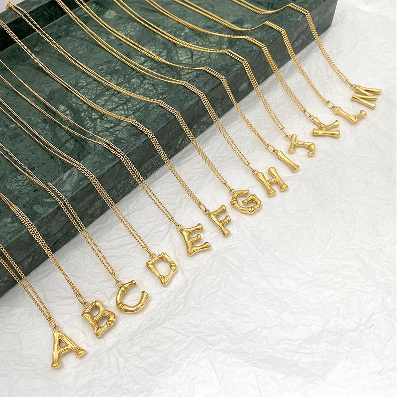 Trendy European & American Bamboo Joint Gold Necklace with 26 English Letters