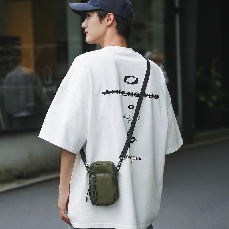 Mobile phone bag female messenger 2025 new mini small bag canvas bag fashion casual vertical shoulder key change