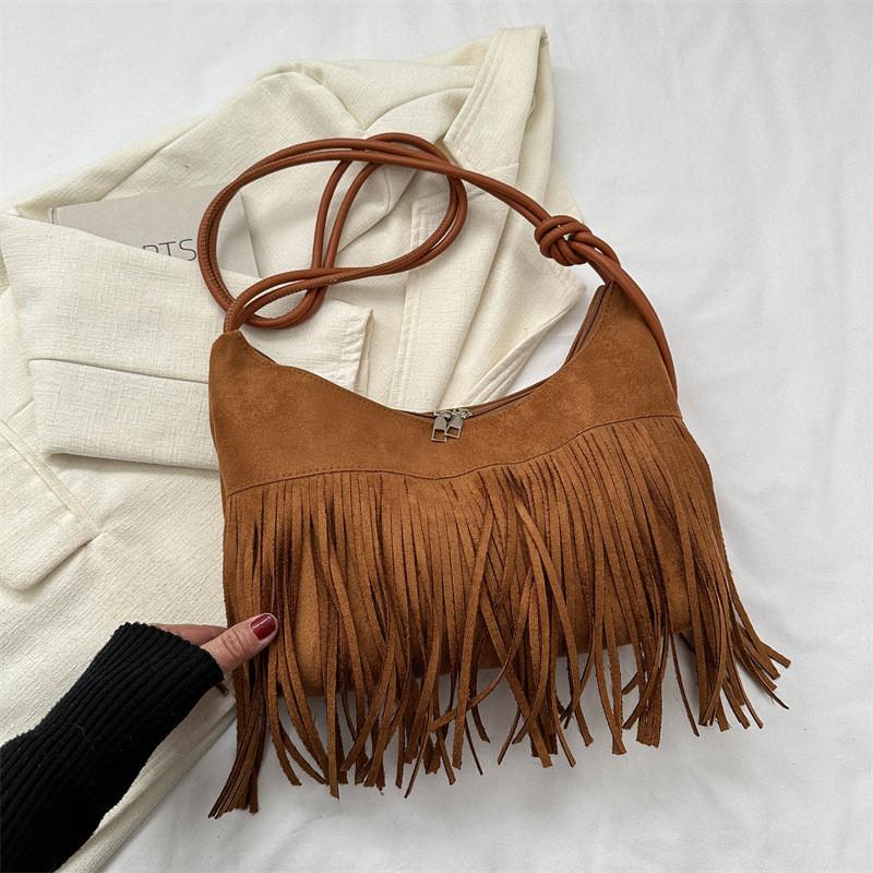 Vintage-inspired Canvas Tote Bag With Tassels And Spacious Interior For Daily Use