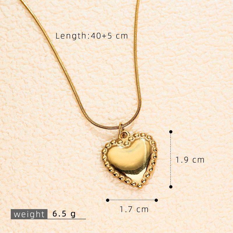 Stainless Steel Gold-Plated Love Heart Necklace with Inlaid Diamonds