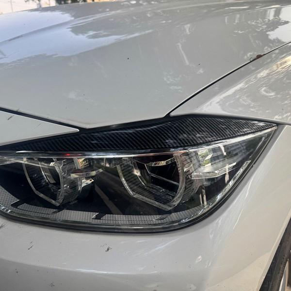 Carbon Fiber Headlight Eyebrow Decal for BMW F30/F35 - Gloss Black Carbon fiber pair