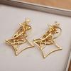 Light Luxury High-end Sense Exaggerated Temperament Earrings Four-leaf Clover Geometric Rhombus Hollow Mosquito Coil Disc Earrings Ear Jewelry