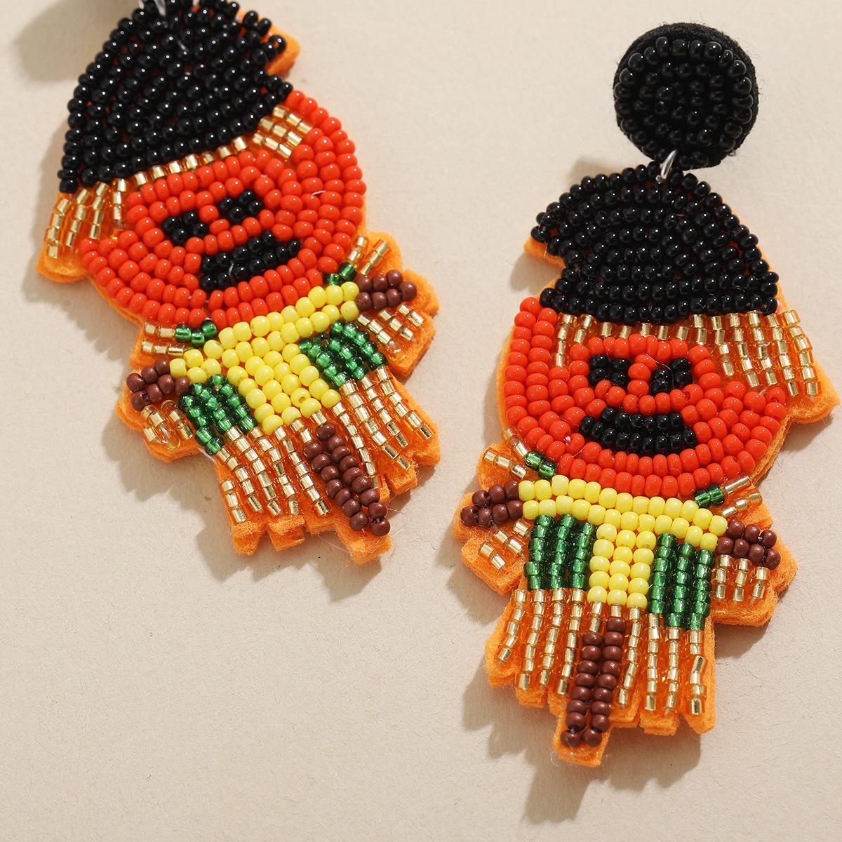 

Hot selling exaggerated and funny pumpkin earrings, personalized and creative rice bead woven earrings, fun Halloween earrings