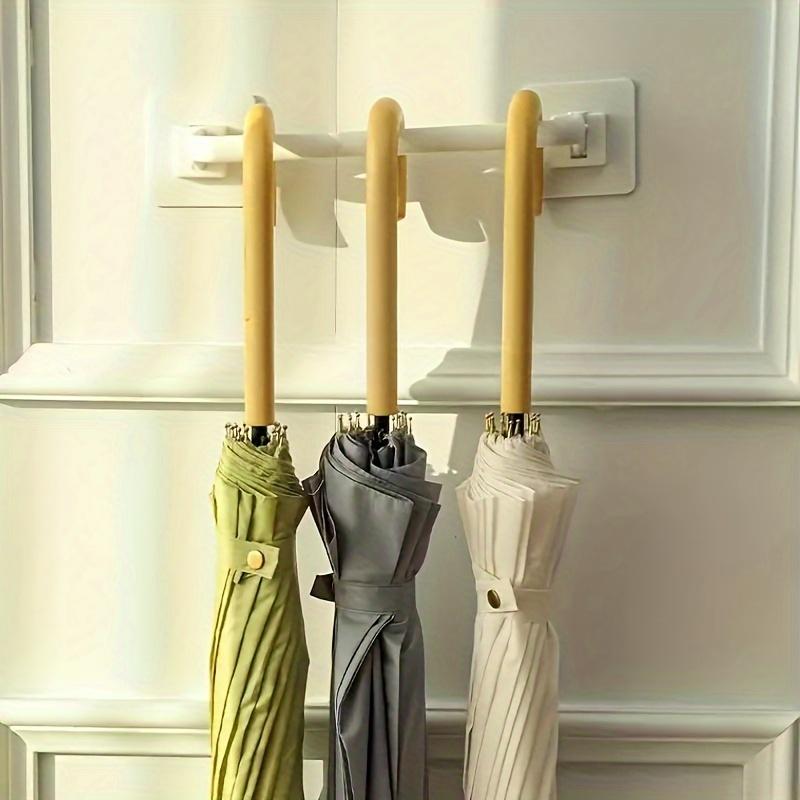 1pc Modern Wall-Mounted Umbrella Holder - Plastic, Casual Style, Easy Install, Space-Saving Design for Organizing Umbrellas and Draining Rainwater