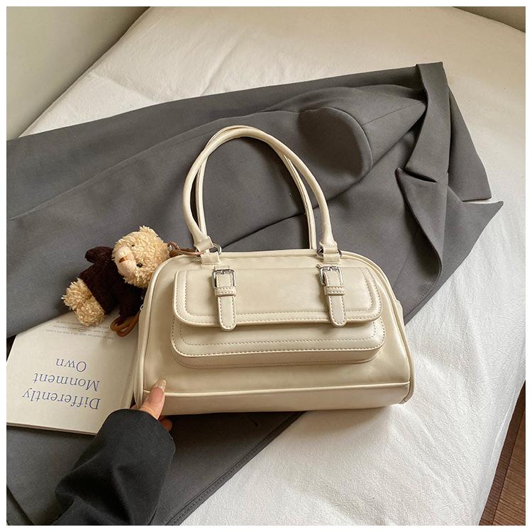 Eine modische, schlichte und elegante, Nischen-Casual-Einzelschultertasche für Damen, eine koreanische Version der beliebten Pillow Bag