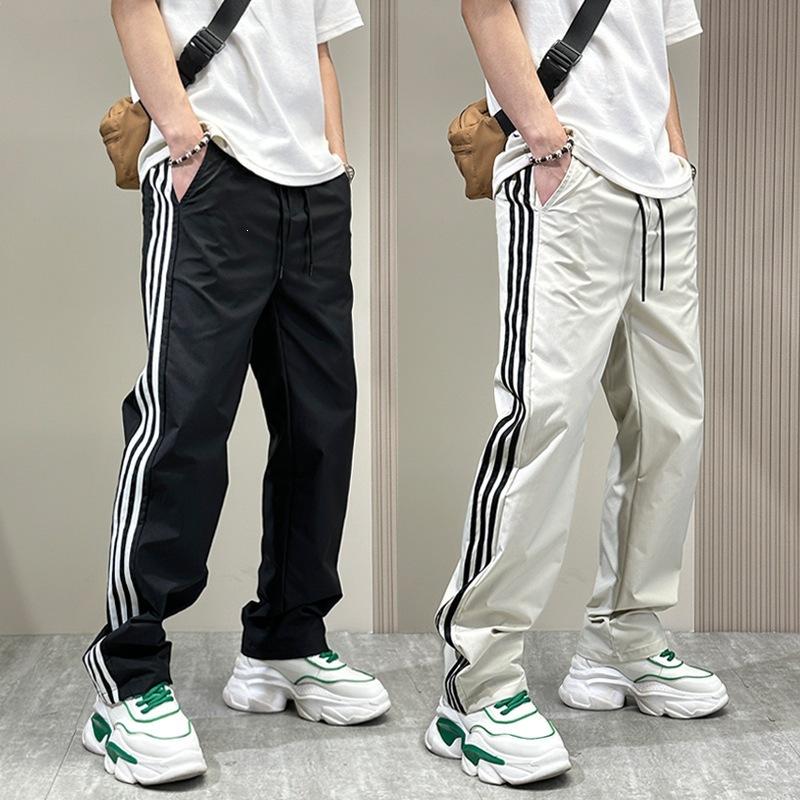 Sommer neue gestreifte schnelltrocknende lässige Hose Herren trendige Marke lockere lässige gerade Sporthose